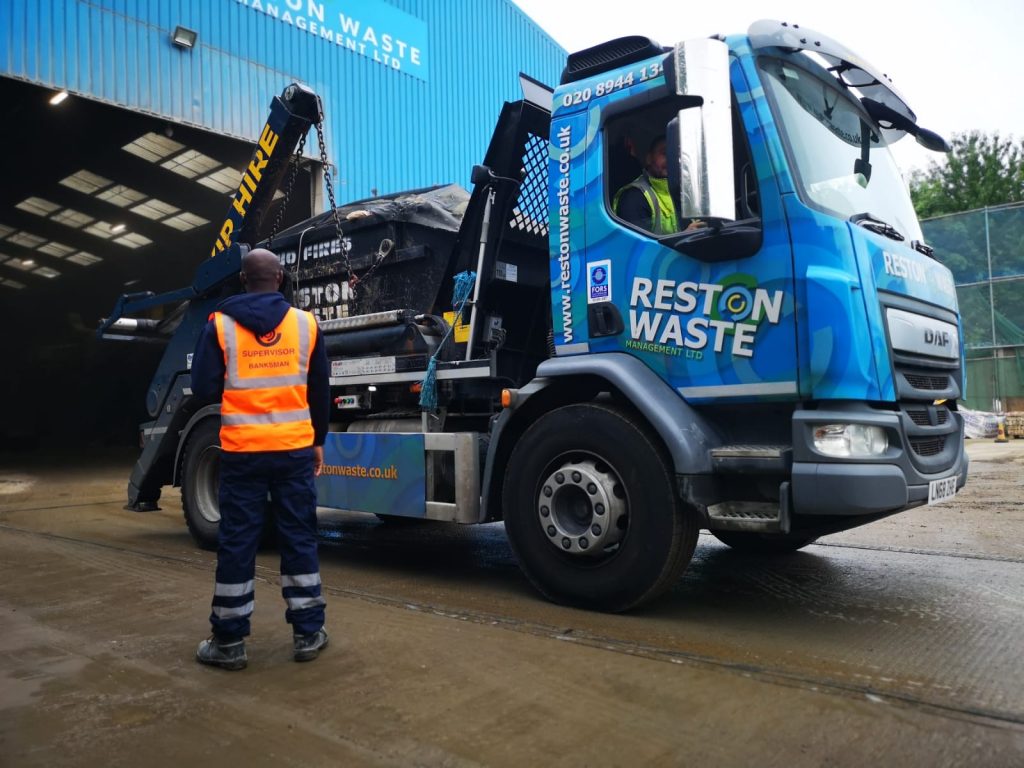 Reston Waste lorry full with garden waste